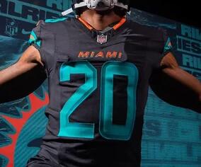 Dolphins unveil new dark blue rivalry jersey